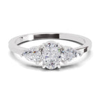 0.60 Carat Three-Stone Oval & Pear Diamond Engagement Ring