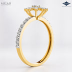 A yellow gold ring with a diamond cluster crown and a pavé band, shown from a side angle on a light gray background. The brand logos 'Ariás Lara Dutta' and 'Sparkle' are visible in the top corners.