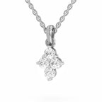 A silver-tone or white gold pendant necklace featuring a small floral or clover-like cluster of clear gemstones on a delicate chain, shown against a plain white background.