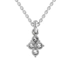 A silver-toned necklace with a delicate chain and a small pendant featuring four clear gemstones arranged in a cross or clover-like shape on a plain white background.
