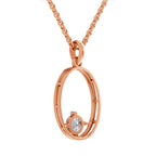 A rose gold necklace with a circular open-frame pendant featuring a small clear gemstone, shown against a plain white background.