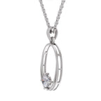 A silver-toned oval pendant necklace featuring a single round clear gemstone in a prong setting, suspended from a matching chain against a plain white background.