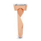 A rose gold geometric ring with a square-cut clear gemstone, shown from a front-facing perspective on a clean white background.