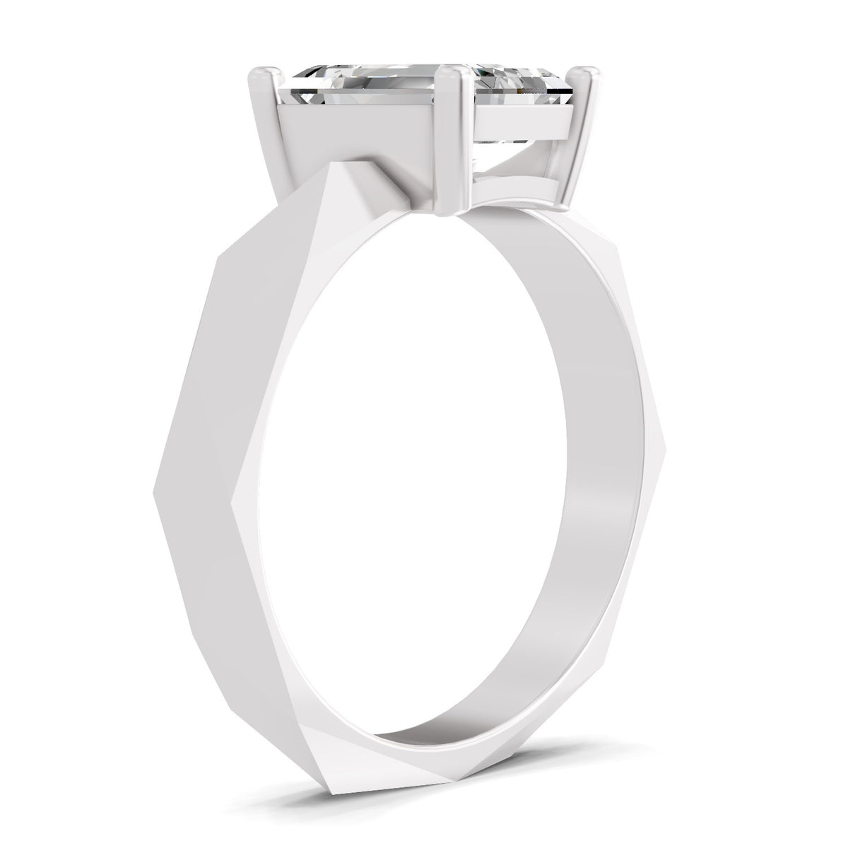 A white gold or platinum solitaire ring featuring a round brilliant-cut gemstone, shown from a side profile view on a clean white background.