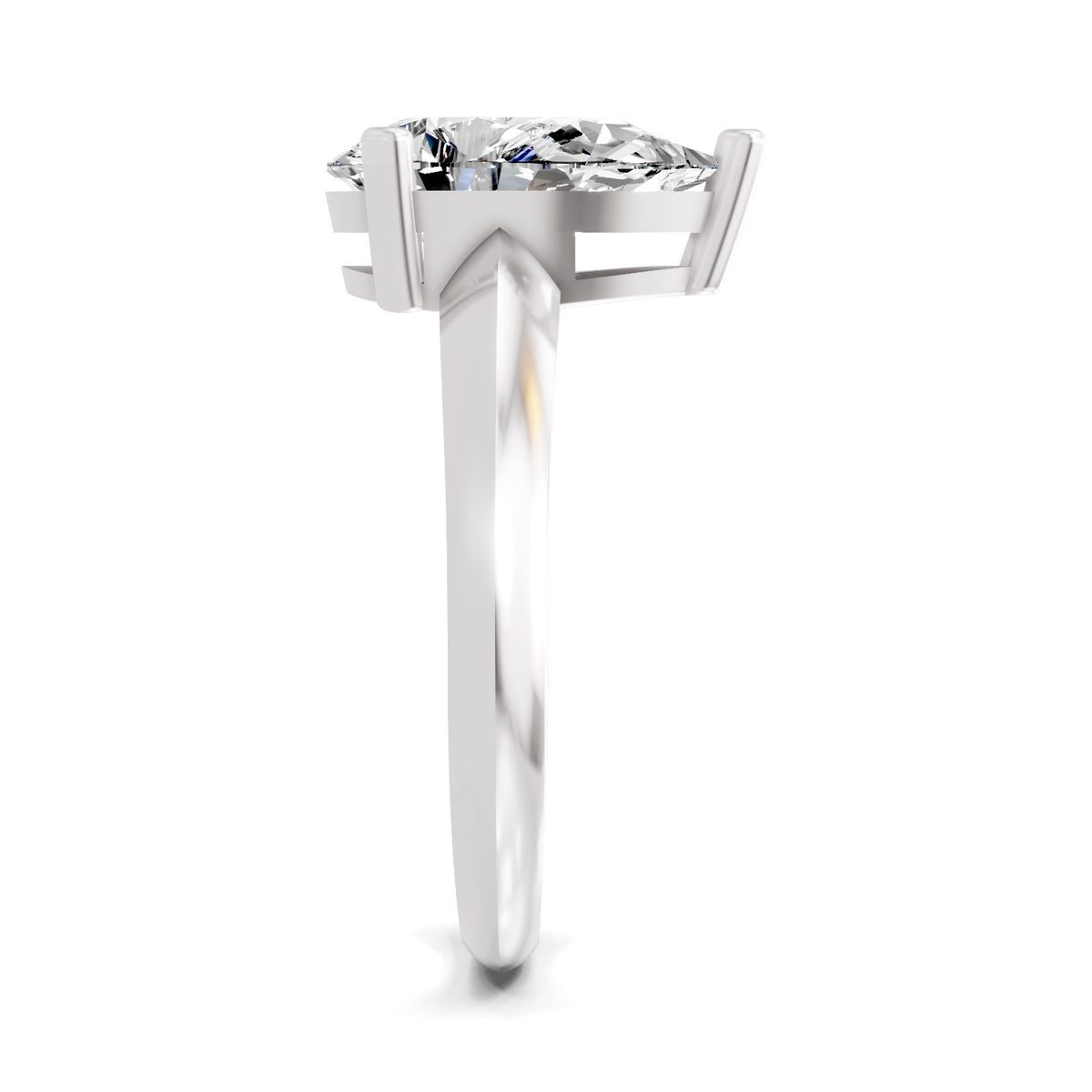 Side view of a round brilliant-cut diamond ring featuring a polished white gold band and a four-prong setting, displayed on a white background.


