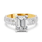 Top view of a yellow gold emerald-cut 2.00 ct diamond engagement ring with a pavé diamond band