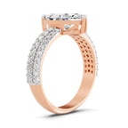 Angled view of a rose gold marquise-cut 2.00 ct diamond engagement ring with a pavé diamond band