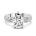 Top view of a white gold pear-cut 2.00 ct diamond engagement ring with a pavé diamond band