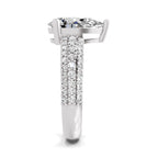 Side view of a white gold pear-cut 2.00 ct diamond engagement ring with a pavé diamond band
