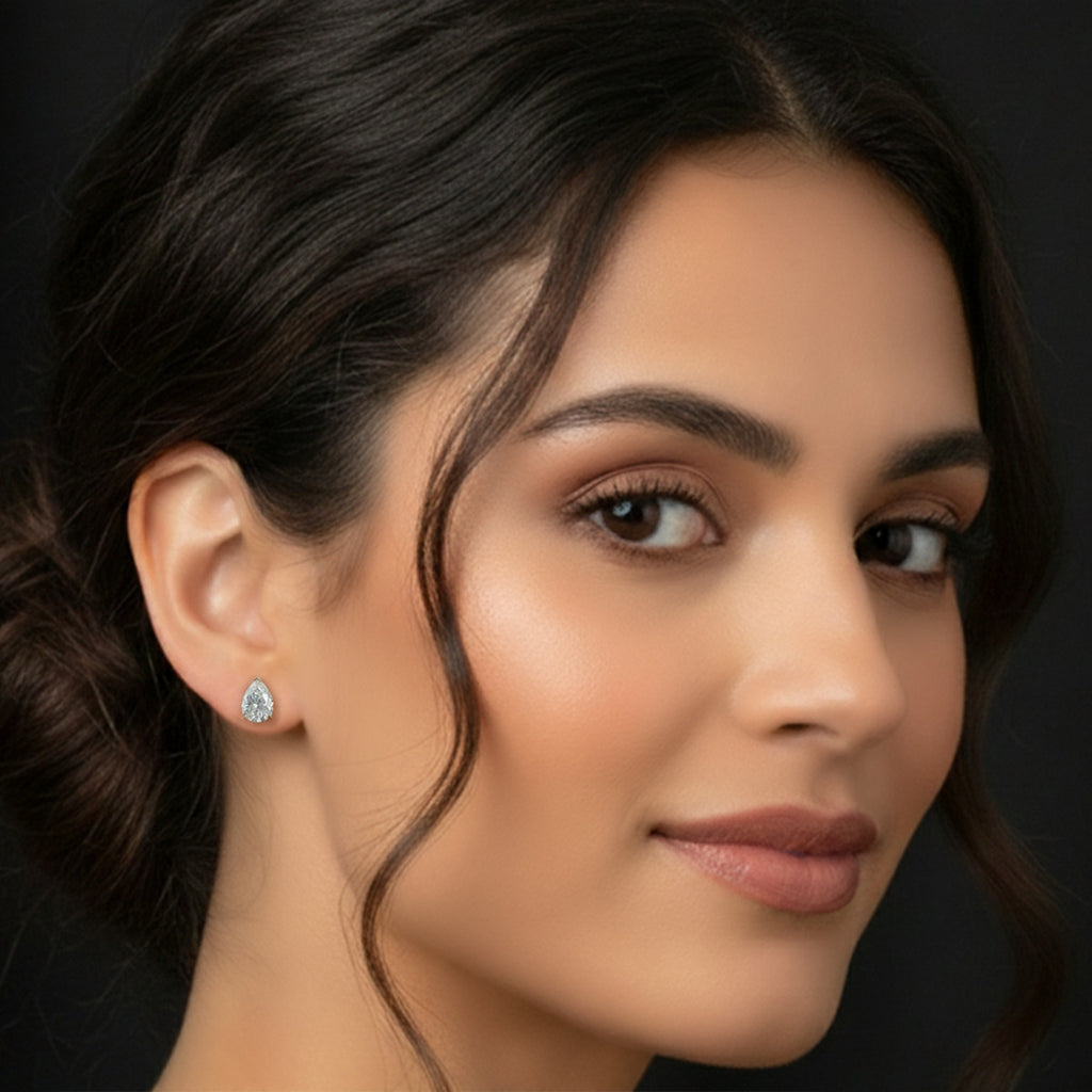 7.35 Carat 14K Gold Pear Stud Earring