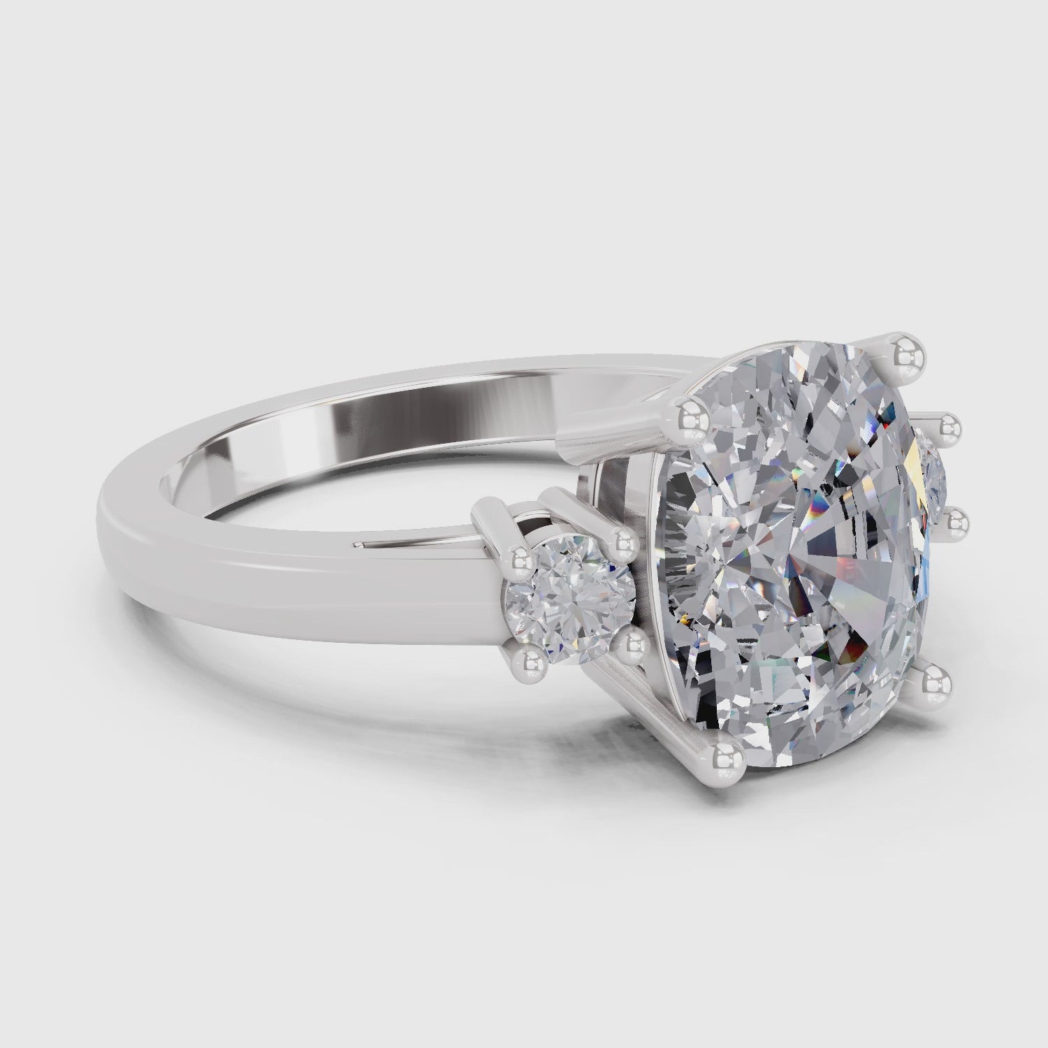 Refined Cushion Three-Stone Diamond Engagement Ring
