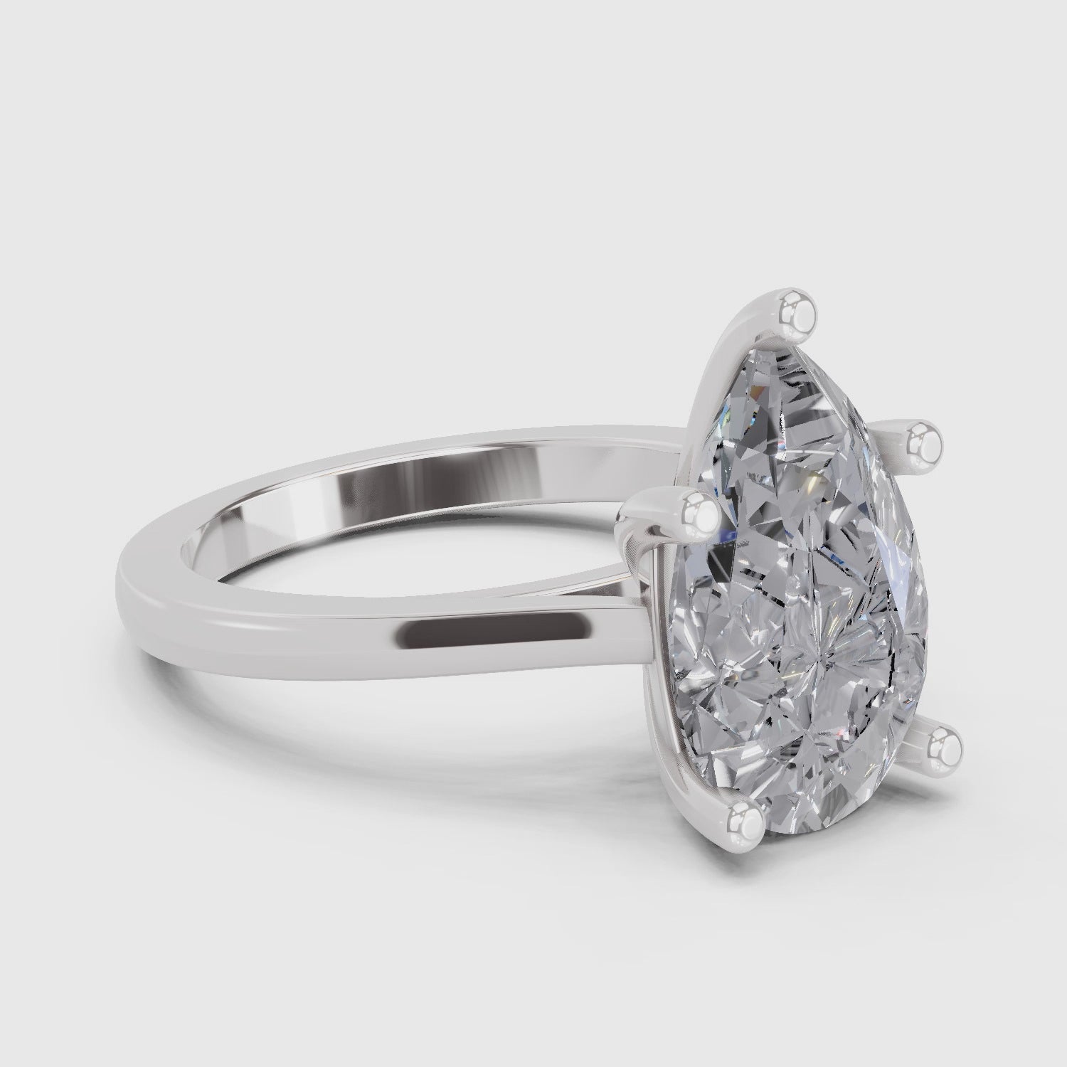 Lustrous Pear Solitaire Diamond Ring