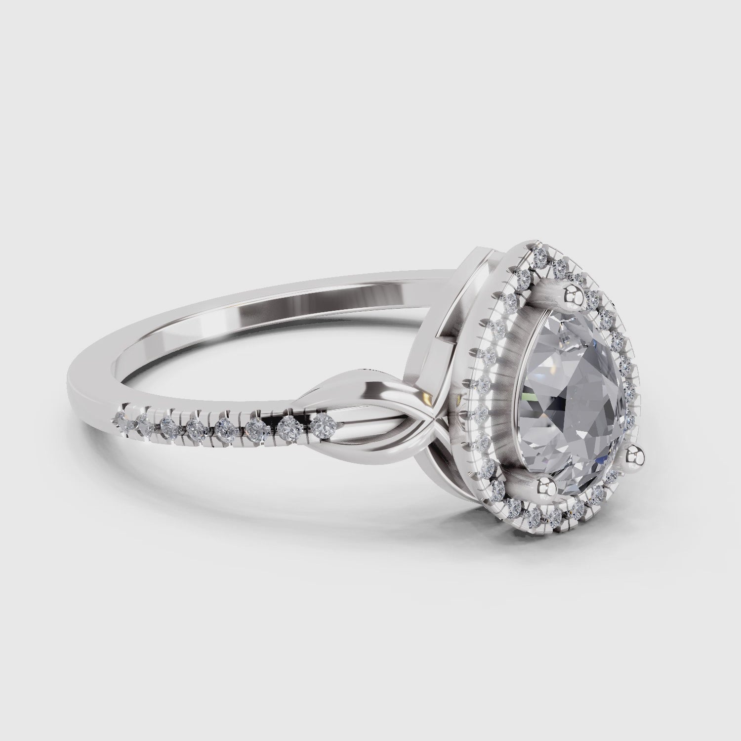 Dazzling Pear Halo Diamond Engagement Ring