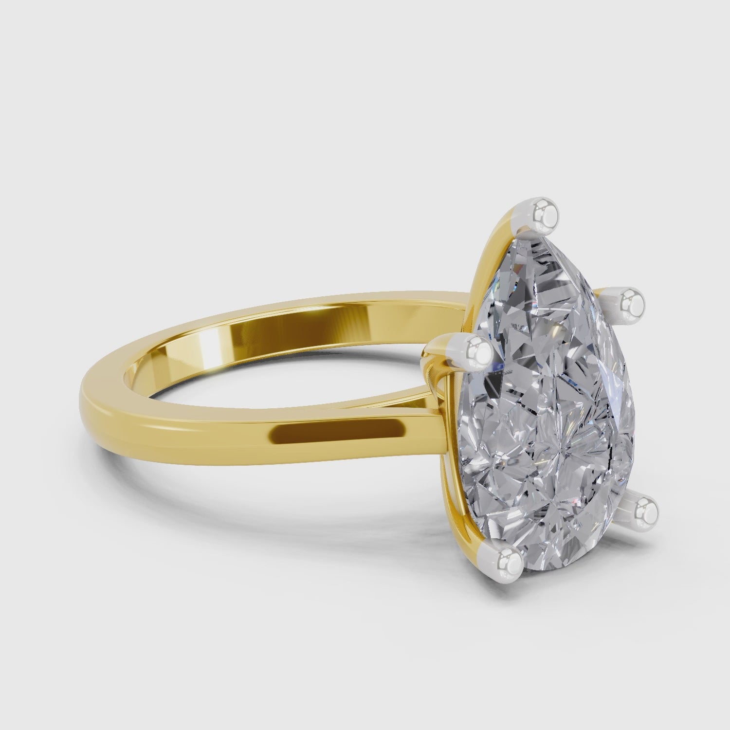 Lustrous Pear Solitaire Diamond Ring