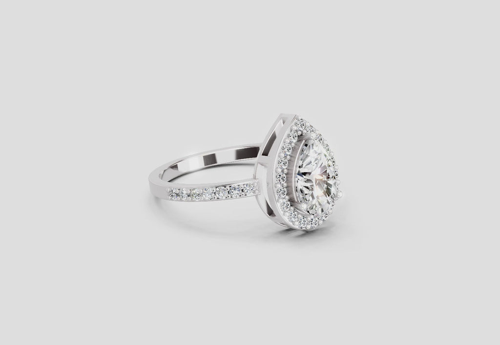 Gleaming Pear Halo Diamond Engagement Ring