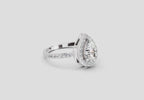 Gleaming Pear Halo Diamond Engagement Ring