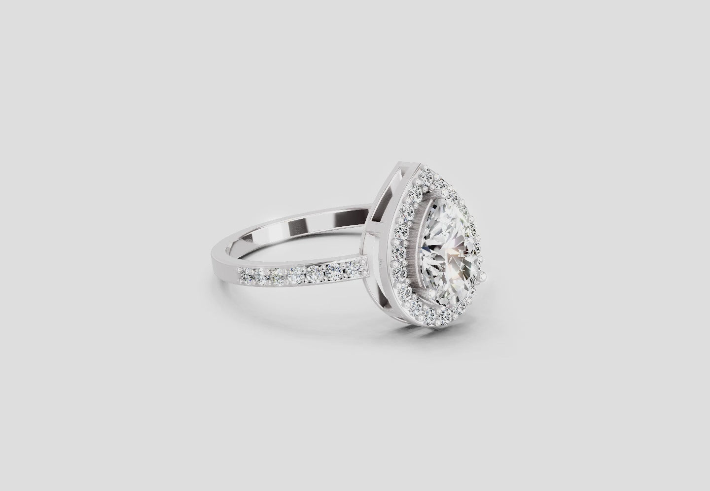 Gleaming Pear Halo Diamond Engagement Ring